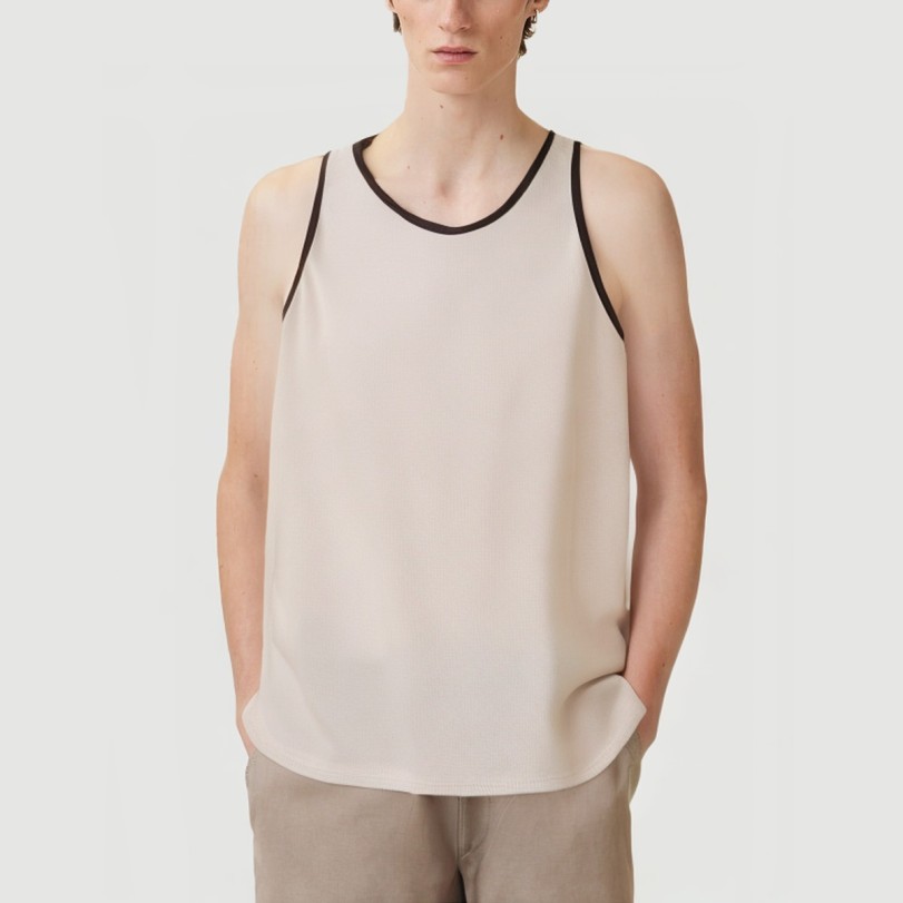 Vest with embossed print and embroidered beads